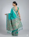 Elegant Teal Silk Saree with Intricate Floral Zari Border