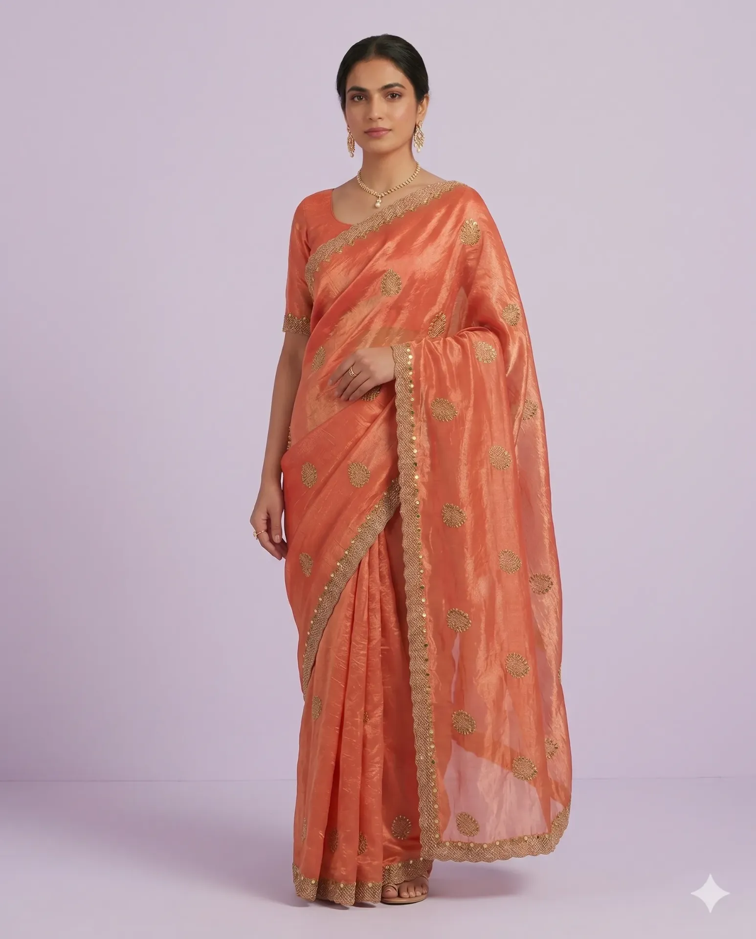 Elegant Silk Saree with Delicate Zari Buti and Scalloped Border